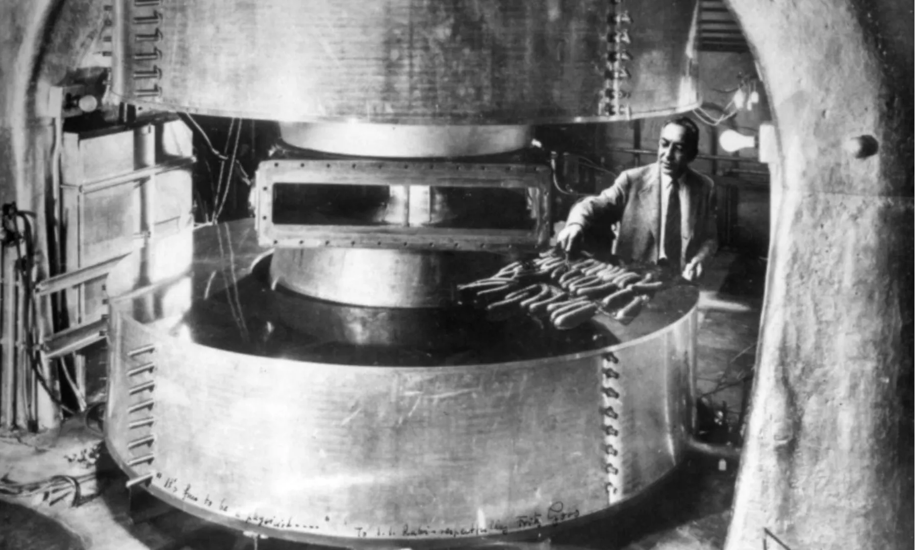 A doctored photo by Fritz Goro of I.I. Rabi grilling hot dogs on the Pupin cyclotron