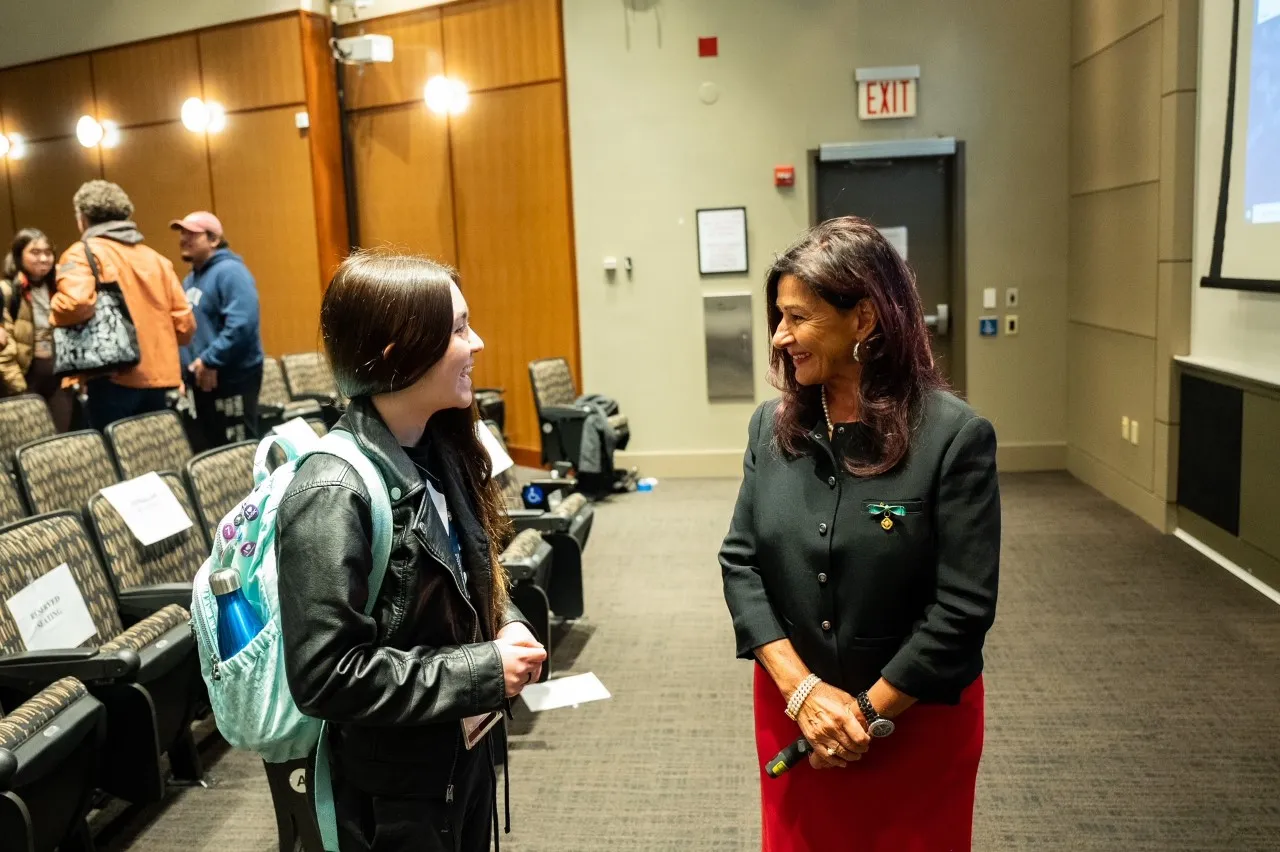 Dr. Aprile and a student at the CS Wu Memorial Lecture